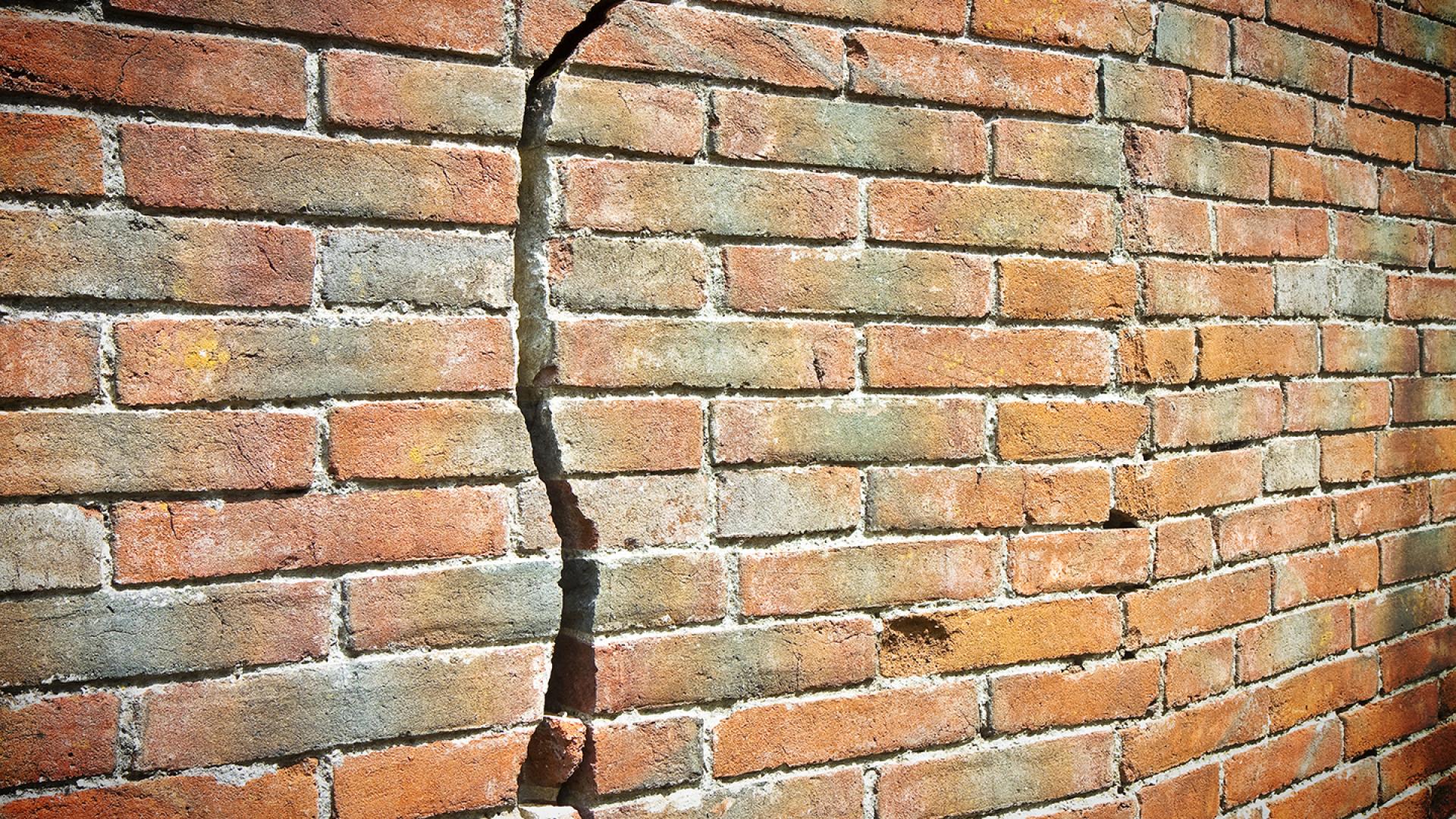 Cracked brick wall