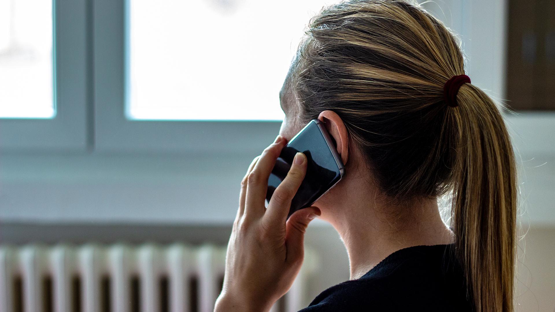 Close up of woman using a mobile phone