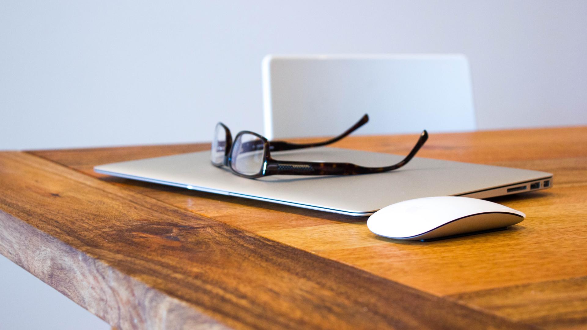 Glasses and laptop